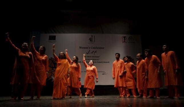 Pakistani dancer Sheema Kirmani and her troupe perform during a conference on International Women's Day, organised by Tehrik-e-Niswan, a cultural action group working on women's development through theatre, at the Art's Council in Karachi,
