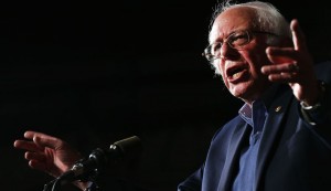 ESSEX JUNCTION, VT - MARCH 01: Democratic presidential candidate Bernie Sanders speaks to supporters after winning the state of Vermont on Super Tuesday on March 1, 2016 in Essex Junction, Vermont. Thousands of Americans across the country are participating in Super Tuesday, the biggest day of the 2016 primary season. Thirteen states and one territory are participating in Super Tuesday: Alabama, Alaska, Arkansas, Colorado, Georgia, Massachusetts, Minnesota, Oklahoma, Tennessee, Texas, Vermont, Virginia, Wyoming and American Samoa. This years election, with strong candidates on both the left and the right, is shaping up to be one of the most exciting and divisive in recent history. (Photo by Spencer Platt/Getty Images)