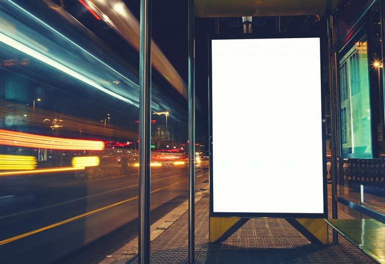 Illuminated blank billboard with copy space for your text messag