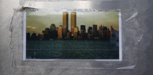Picture of World Trade Center towers is seen outside New York Fire Department Engine Company and Ladder Company 10 near the 9/11 Memorial site in New York