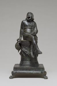 Incense Burner Shaped as a Comic Actor Seated on an Altar
