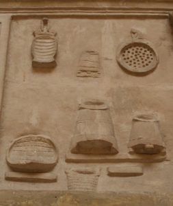 The Mills-Bakeries of Ancient Ostia and the Distributions of Free Grain