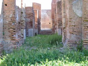The Mills-Bakeries of Ancient Ostia and the Distributions of Free Grain