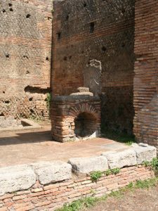 The Mills-Bakeries of Ancient Ostia and the Distributions of Free Grain