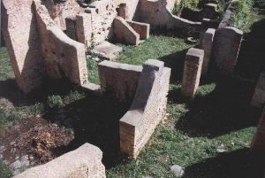 The Mills-Bakeries of Ancient Ostia and the Distributions of Free Grain