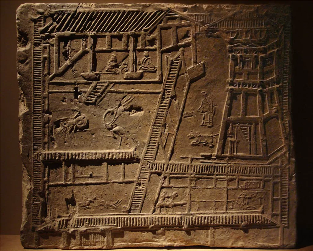This brick, from the chamber wall of a rich and powerful family's tomb, depicts the home of a wealthy, influential Han official