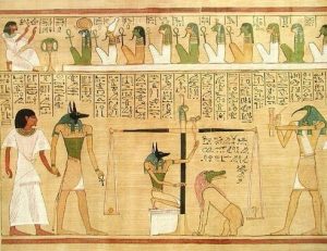 In this section from the Book of the Dead for the scribe Hunefer, the Weighing of the Heart is shown.