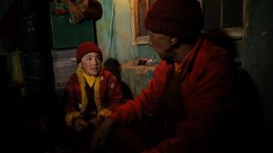 Padma Angdu with his uncle and spiritual guardian