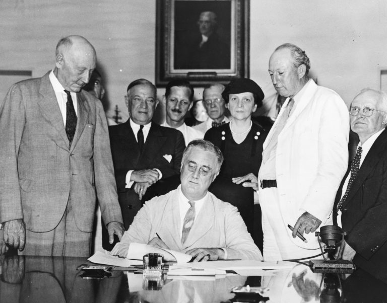 Roosevelt signs Social Security Bill