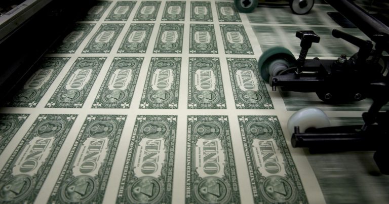 Operations At The Bureau Of Engraving And Printing As The $1 Bill Is Printed