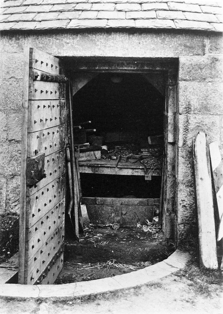 Vault with mortsafe to prevent grave theft in graveyard at Udny, Aberdeenshire