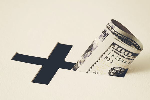 Cash Remains Sacred in American Churches