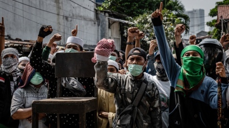 Indonesia’s Election Exposes Growing Religious Divide 1 052719-06-Indonesia-Religion
