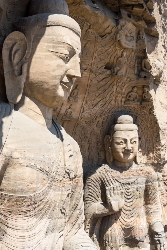 Buddha (left) and attendant Buddha (right), Cave 20 at Yungang