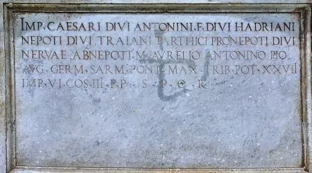 The inscription on the plinth of the replica statue of Roman Emperor, Marcus Aurelius, in the Piazza Campidoglio
