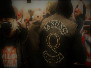 Without Their 'Messiah,' QAnon Believers Confront a Post-Trump World 8 012821-01-Politics-QAnon