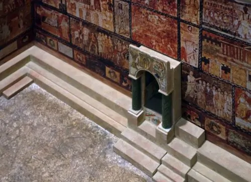 View of the western wall of a model of the Dura-Europos Synagogue with narrative wall paintings and Torah shrine as it may have appeared between 244 and 256 C.E.