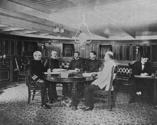 Photograph from the 12 April 1898 edition of Uncle Sam's Navy of the Sampson Board's court of inquiry meeting aboard the lighthouse tender USLHT Mangrove in Havana Harbor, ca. March 1898
