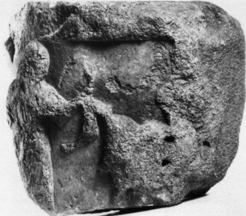 Woman holding the animal, liknon on trapeza (?) and idol of Dionysos