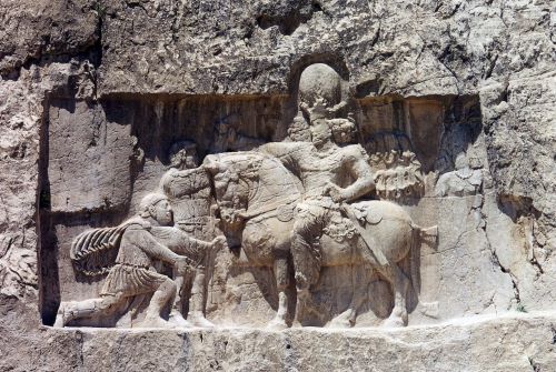 Rome and Persia at War: How Conflict Fueled the Third-Century Crisis (230–266 CE) 6 Rock-face relief at Naqsh-e Rustam of Shapur (on horseback) with Philip the Arab and Emperor Valerian