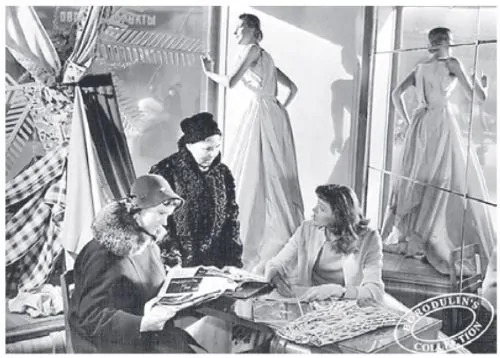 Designers consult visitors on questions of style at the atelier of ODMO, 1951
