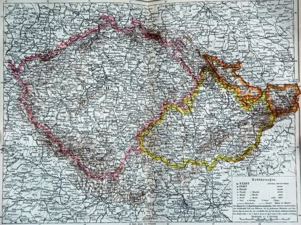 An 1892 map showing Bohemia proper outlined in pink, Moravia in yellow, and Austrian Silesia in orange.
