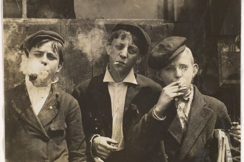 Newsies: 11:00 A.M. Monday, May 9th, 1910. Newsies at Skeeter's Branch, Jefferson near Franklin. They were all smoking. St. Louis, Missouri.