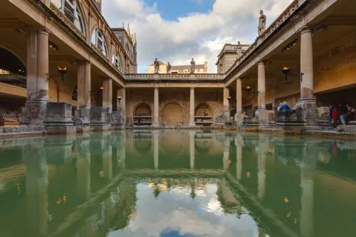 Defixiones and Cunei: The Sacred Aquae Sulis in Ancient Roman Britannia 2 View of the main pool (โGreat Bathโ) of the Roman spa fed by the sacred spring, Bath, England