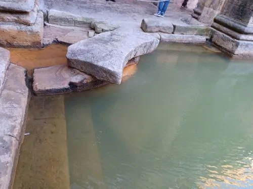 Defixiones and Cunei: The Sacred Aquae Sulis in Ancient Roman Britannia 15 Northwest corner of the โGreat Bath,โ where water flows in from the sacred spring