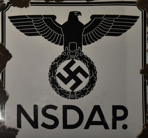 Dark Sky, White Costumes: Dehumanization and False Fronts in Nazi Germany