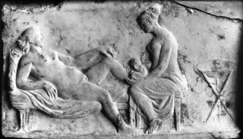 Ancient Roman relief carving of a midwife