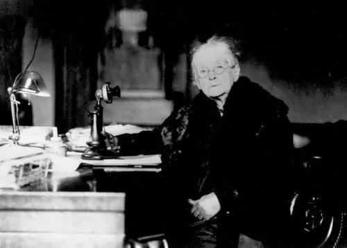 Rebecca Latimer Felton seated at her desk