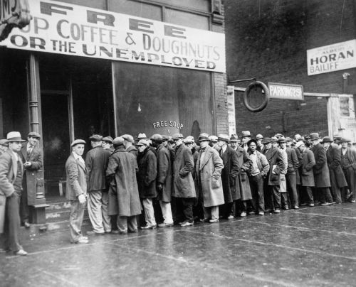 Unemployed people lined up outside a soup kitchen opened in Chicago by Al Capone during the Great Depression in February 1931