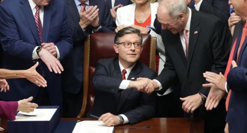 Speaker of the House Rep. Mike Johnson (R-La.) celebrates with fellow House Republicans during an enrollment ceremony of H.R. 1, the One, Big, Beautiful Bill Act at the U.S. Capitol on July 3, 2025 in Washington, D.C