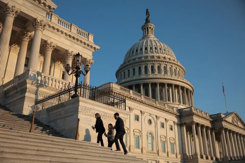Members of the House walk up the steps of the U.S. Capitol during a procedural vote on the One Big Beautiful Bill Act on July 3, 2025, in Washington, D.C.
