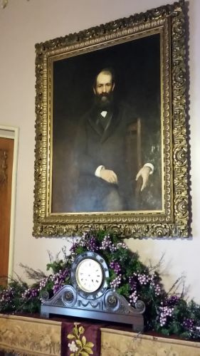 Jay Gould's portrait hanging in his office at Lyndhurst