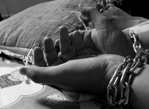 Why Is Trump Halting Work on Addressing Human Trafficking? 10 Person in chains