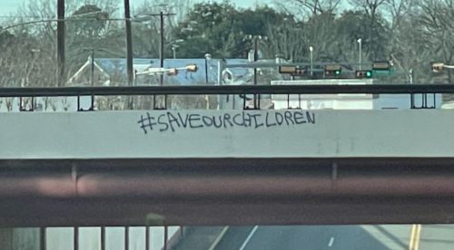 The Cloak of Outrage: Predators Hide behind and within the Moral Panic of QAnon 9 #SaveOurChildren graffiti on a bridge in Lufkin, Texas in 2021
