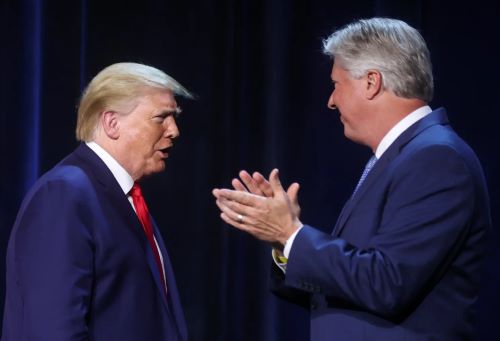 The Cloak of Outrage: Predators Hide behind and within the Moral Panic of QAnon 12 Donald Trump is greeted by Pastor Robert Morris as he arrives for a roundtable discussion with members of the faith community, law enforcement and small business at Gateway Church Dallas Campus in Dallas, Texas, on June 11, 2020