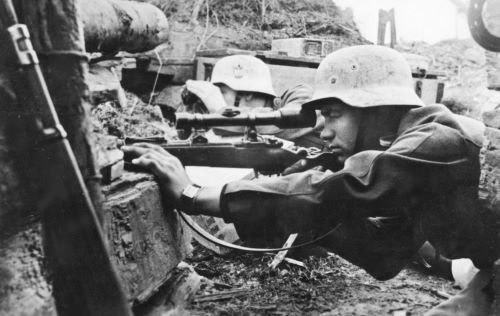From Bolt to Burst: The StG 44 and the Shifting Geometry of Modern War 13 German sniper team with Mauser Karabiner 98k rifle fitted with a Dialytan RH36 4×32 telescopic sight