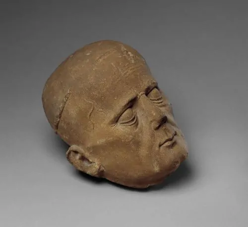 The identity of this remarkably realistic portrait is not known, but the shaved head (tonsure) indicates that a priest or a monk is represented.
