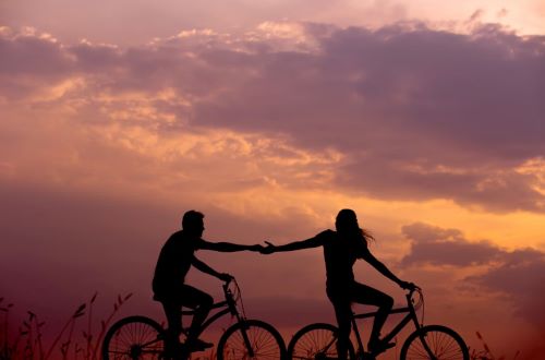 Couple on bicycles