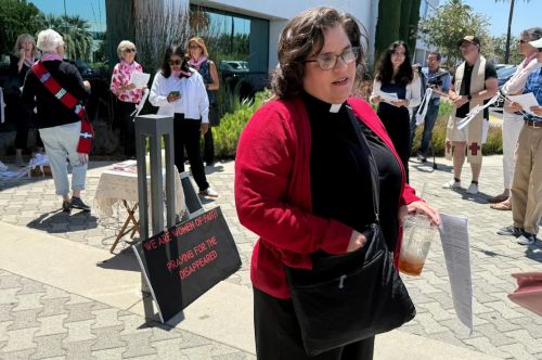 Shepherds in the Storm: How Some Faith Leaders Are Standing with Undocumented Immigrants 9 The Rev. Oona Casanova Vazquez, lead pastor of the South Bay Church of the Nazarene in Torrance, stands outside Santa Ana Immigration Court during a prayer vigil for immigrants in Santa Ana, California