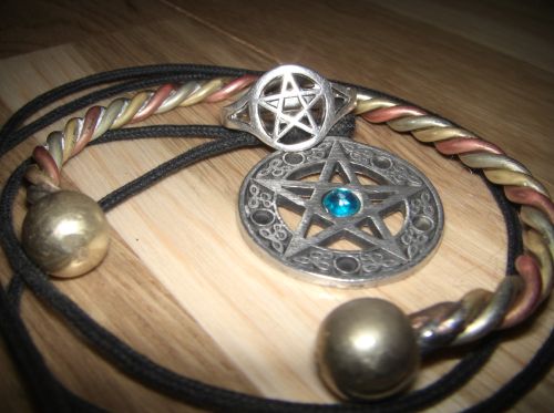 Faith and the Federal Desk: Trump’s New Workplace Religion Rules and the Storm They Invite 12 Wiccan jewellery, showing a pentacle necklace, a pentacle ring, and a torc