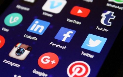 Age of Access: The High Court’s Nod to Social Media Age-Verification Laws 2 Photo of cell phone with social media icons