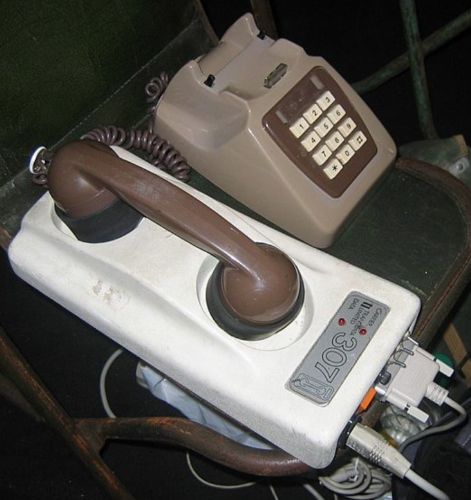 When the Screeching Ends: Last Handshake as AOL Finally Shutters Its Dial-Up Era 2 Acoustic coupler modems used a telephone handset as the audio medium