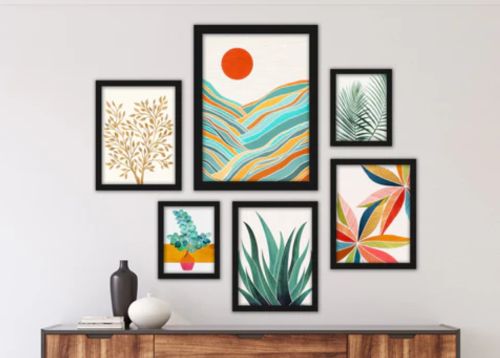 Colorful gallery wall on home’s foyer