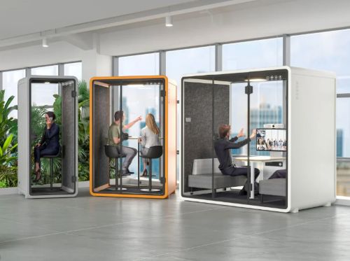 Three privacy pods in large office space