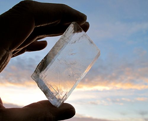 Person holding a medieval sunstone