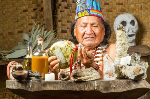 A shaman performing an ayahuasca rite in the Amazon region of Ecuador